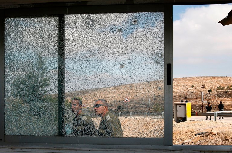 Palestinian Gunman Kills 3 Israelis at West Bank Crossing