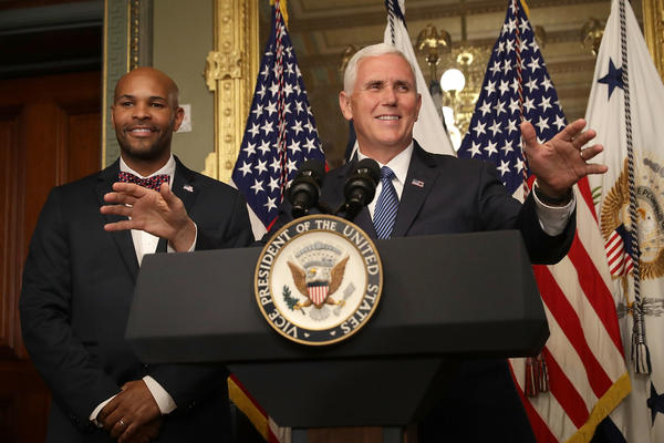 Vice President Mike Pence swears in Jerome Adams as surgeon general