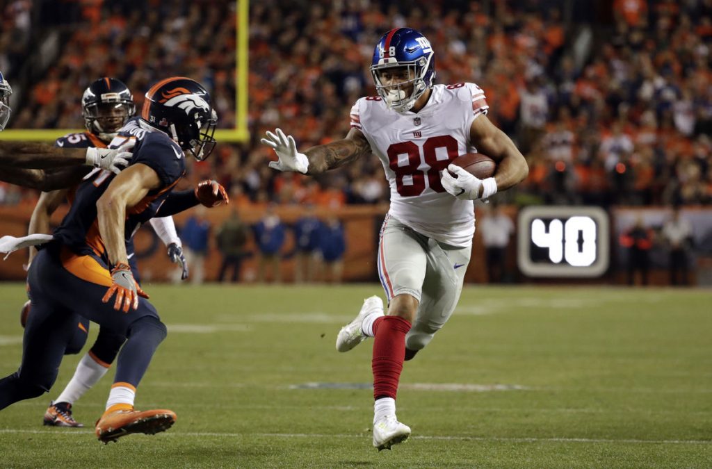 Manning, Pierre-Paul and rest of Giants stun Broncos 23-10