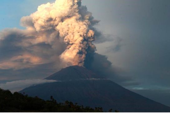 The Latest: Tourists look for flight info or enjoy Bali stay