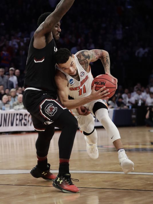 Florida guard Chris Chiozza sprains shoulder in exhibition