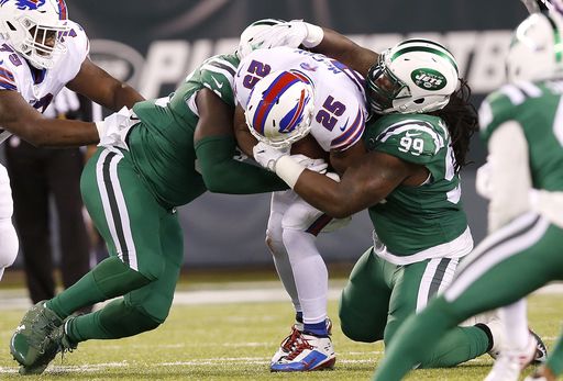 Jets save season with stifling D, strong running game
