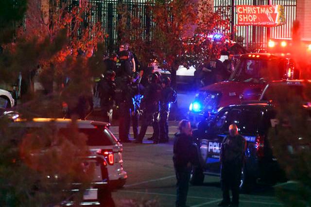 The Latest: Police say shoppers drew guns after shooting