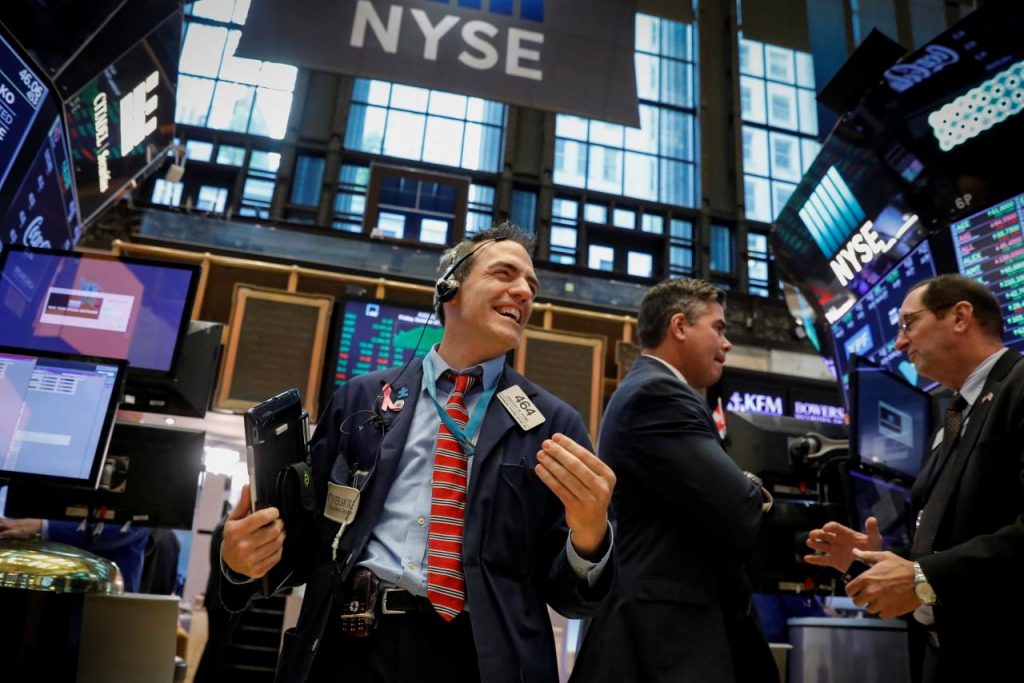 Wall St. ends strong October higher as tech staples lead