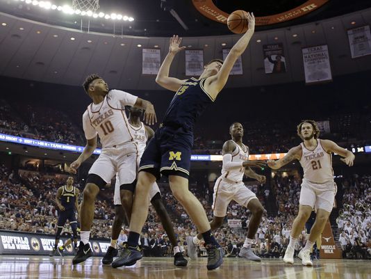 Abdur-Rahkman leads Michigan over Texas 59-52