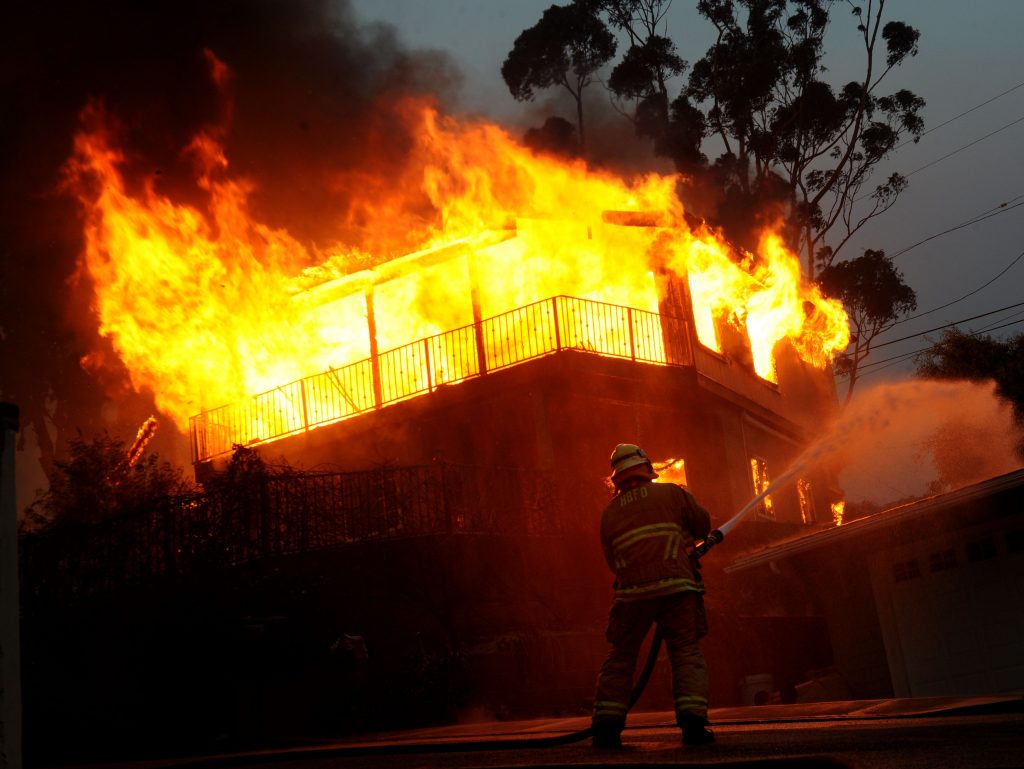 Southern California firefighters race against time, winds