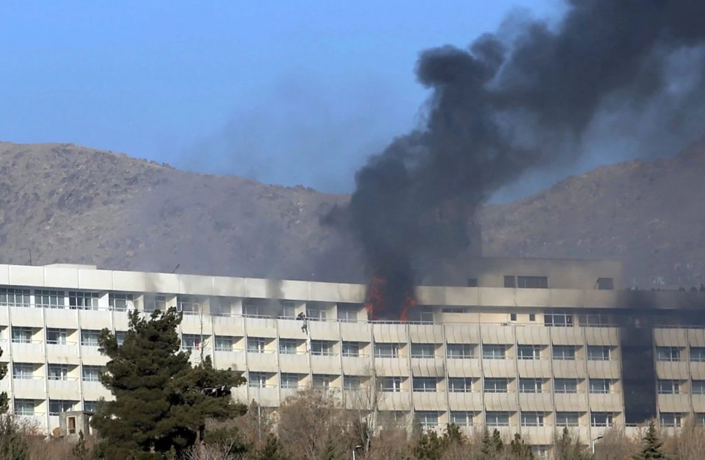 The Latest: US condemns Kabul hotel attack that left 18 dead