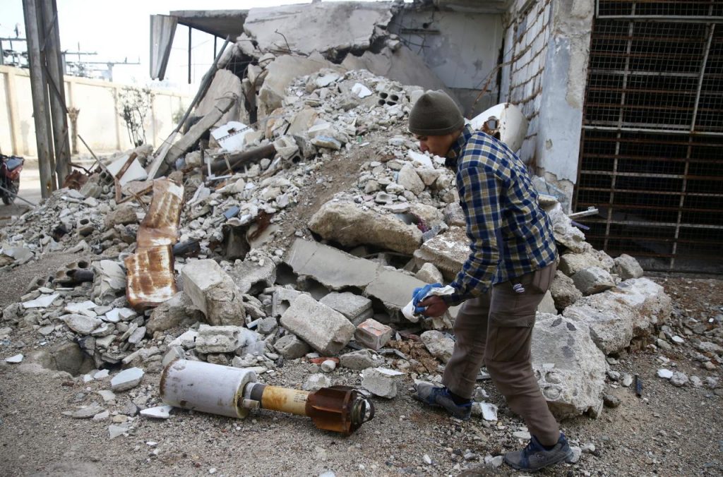 Air strikes pound Syria’s last rebel strongholds, gas chokes civilians