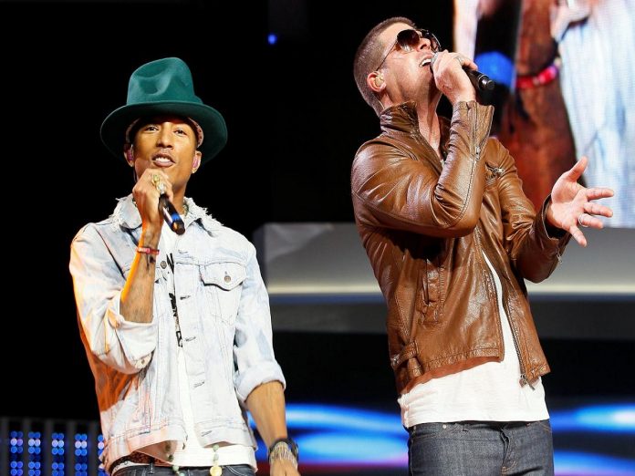 FILE PHOTO: Singer, Williams and Thicke perform together at the Walmart annual shareholders meeting in Fayetteville Marvin Gaye family prevails in 'Blurred Lines' plagiarism case, Entertment News USA, Entertment Breaking News, Latest Entertment News, USA Entertment News