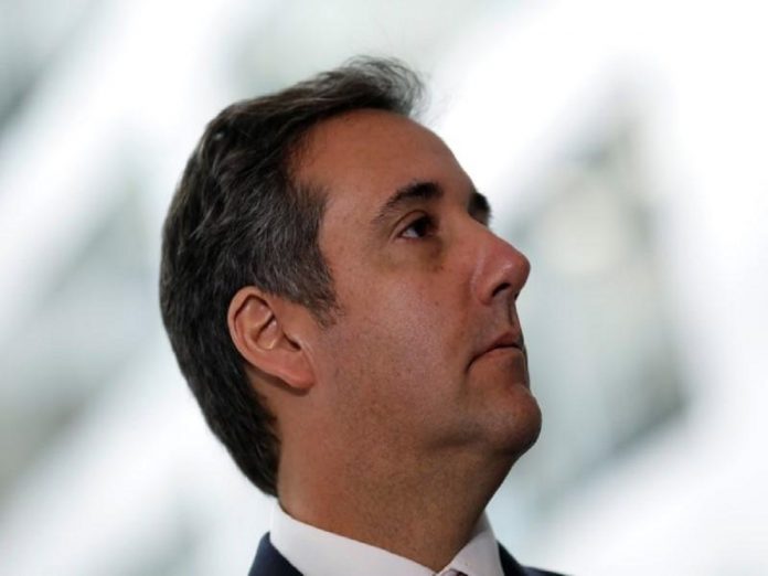 Michael Cohen, President Trump's personal attorney, looks on as his attorney (not pictured) delivers a statement to reporters after meeting with Senate Intelligence Committee staff on Capitol Hill in Washington Factbox: Does attorney-client privilege apply to Trump lawyer raid, Politics News, Latest Politics News, Top Political Headlines, Politics Live News Online, Today Politics News