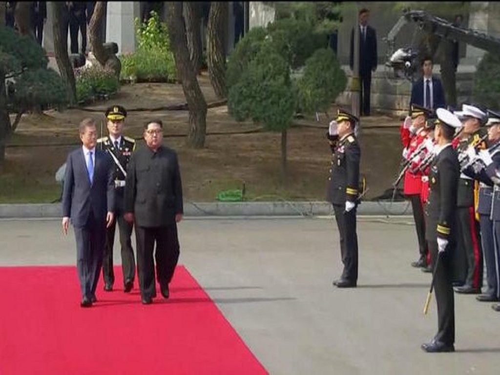 Kim Jong Un walks across border to meet South Korean president