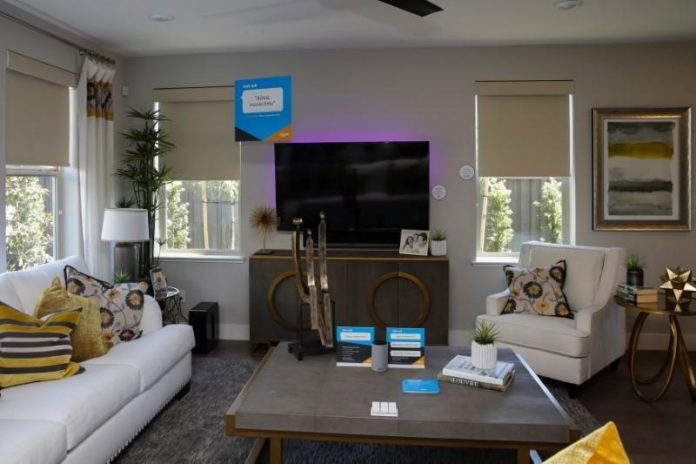 An Amazon Echo lowers the blinds and turns on mood lighting and the TV in response to a voice command in the living room of an Amazon ‘experience center’ in Vallejo Amazon rolls out model 'smart' homes for U.S. shoppers to try out Alexa