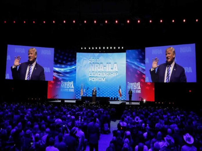 U.S. President Donald Trump speaks at a National Rifle Association (NRA) convention in Dallas Trump back in step with NRA after doubts over Parkland shooting, Politics News, Latest Politics News, Politics News Usa, Politics Live News, Top Politics News, Politics Live News Online