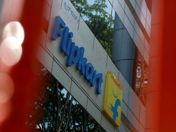 FILE PHOTO: The logo of India's e-commerce firm Flipkart is seen on the company's office in Bengaluru Walmart likely to announce Flipkart deal before end of week: sources, Business News Today, Live Updates News, latest Business News USA, Business News, Latest and Daily Business News