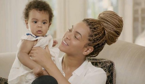 Beyonce & Daughter Blue Ivy Snuggle On Football Field In Never-Before-Seen Family Pics Beyonce & Daughter Blue Ivy Snuggle On Football Field In Never-Before-Seen Family Pics