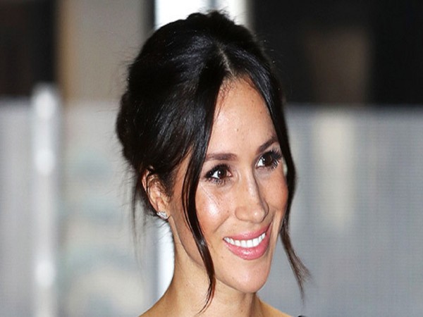 Meghan Markle Stuns In Jackie O-Inspired Dress For Latest Royal Outing With Prince Harry Meghan Markle Stuns In Jackie O-Inspired Dress For Latest Royal Outing With Prince Harry