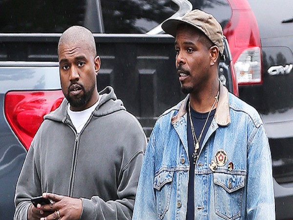 Kanye West Cuts Off Call With Kim To Awkwardly Hug Paparazzi After Heartfelt Talk