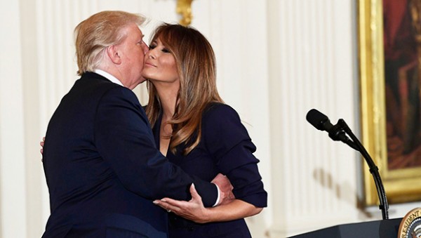 Donald & Melania Trump's Public Kiss Seemed 'Forced' — Body Language Expert Says Donald & Melania Trump's Public Kiss Seemed 'Forced' — Body Language Expert Says