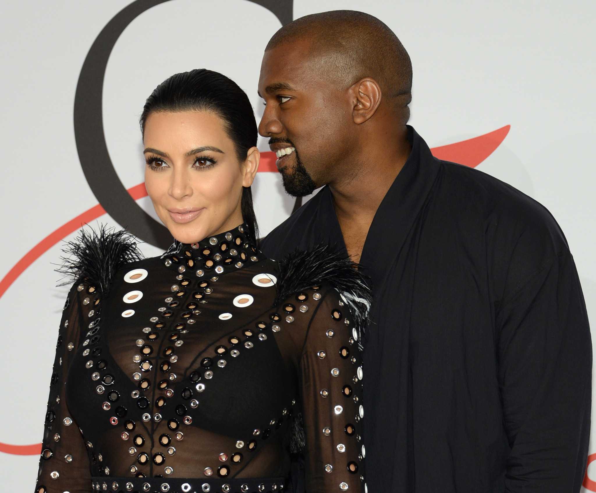 Kanye West and Kim Kardashian at Launch