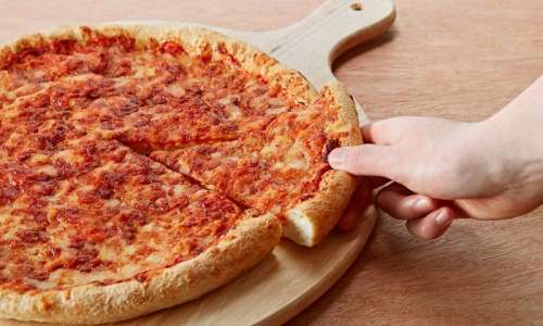 Pizza, Wings, and More at Pauly's Pizzeria - South Loop (Up to 42% Off). Two Options Available.